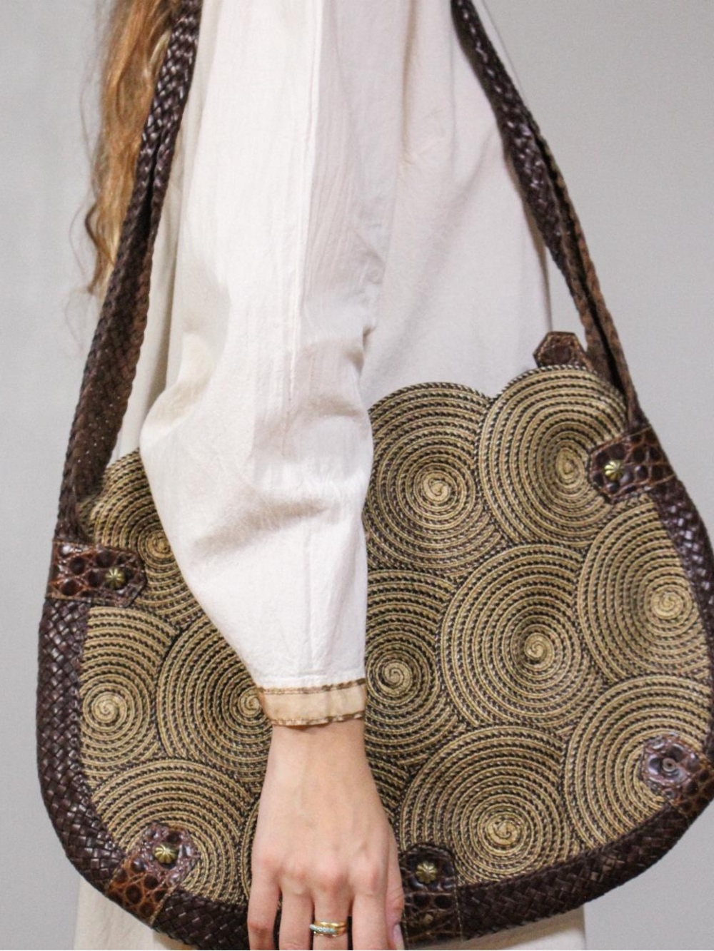 ERIC JAVITS Woven Geometric
Squishee Swirls + Woven Leather
Trim Shoulder Bag